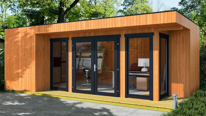 The Allwood Arlanda studio cabin with glass doors.