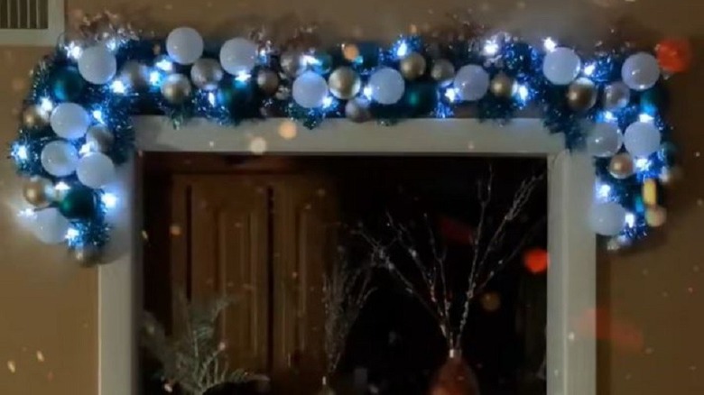 Festive garland made from Dollar Tree bath mats and baubles