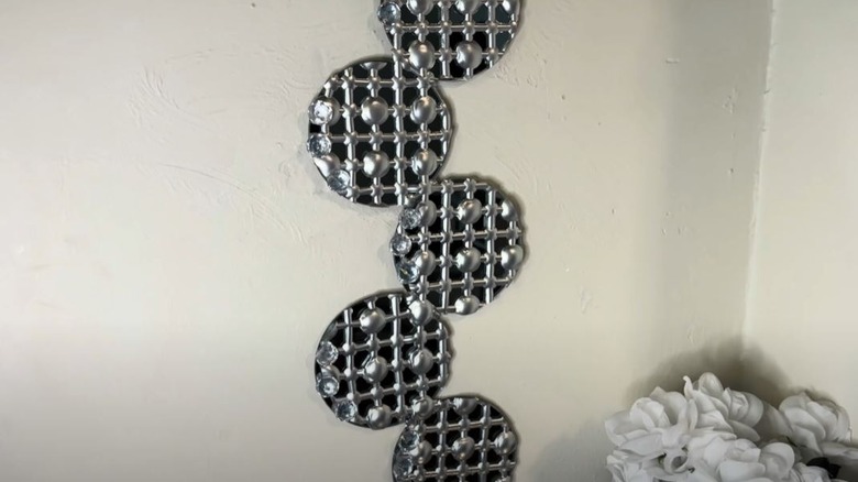 DIY Mirror wall art created with Dollar Tree bath mats