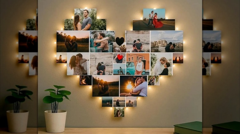 A heart shaped wall hanging trimmed with lights and featuring a collage of photos.