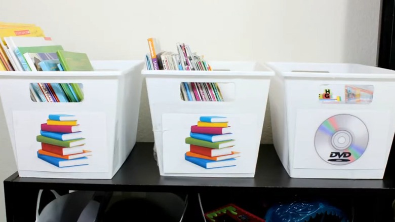 Plastic bins with labels in kids room