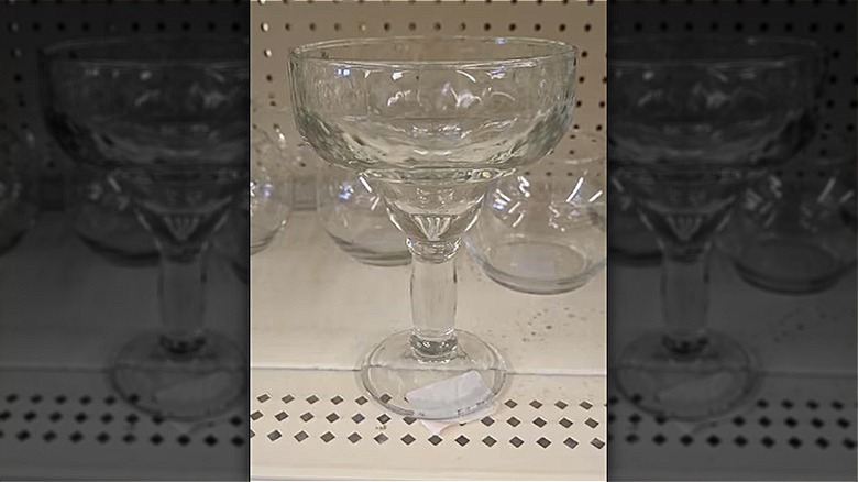 Clear margarita glass on shelf at Dollar Tree