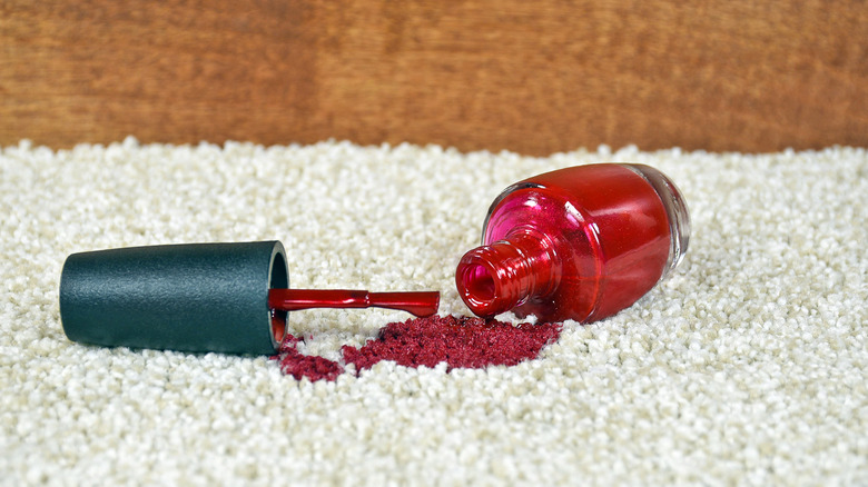 red nail polish on carpet