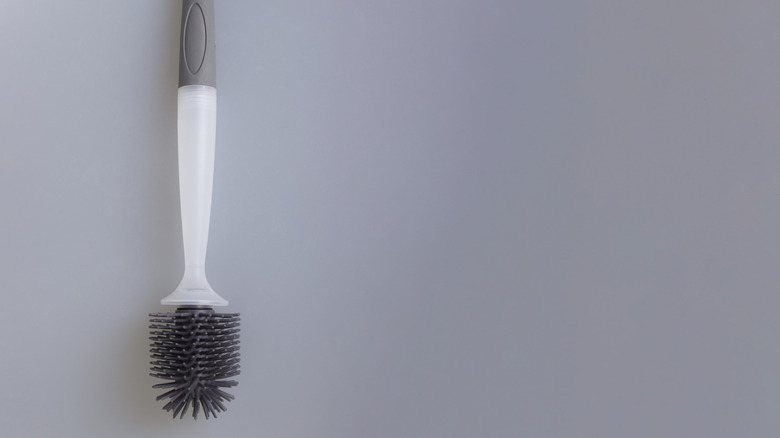 Close up of plastic toilet brush