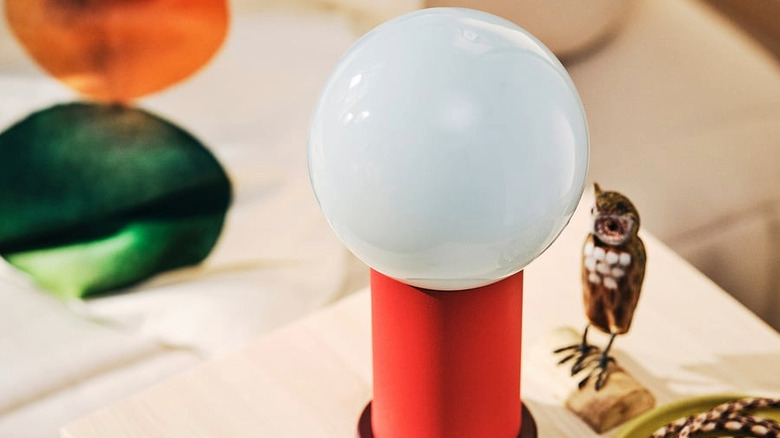A modern-looking portable lamp on a table