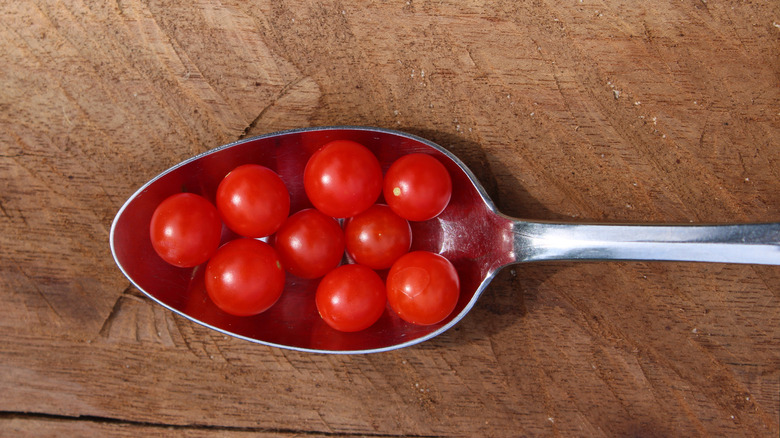 Tiny "spoon" tomatoes in spoon.