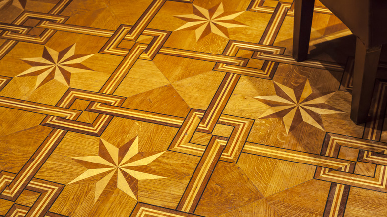 wood floor with detailed inlay