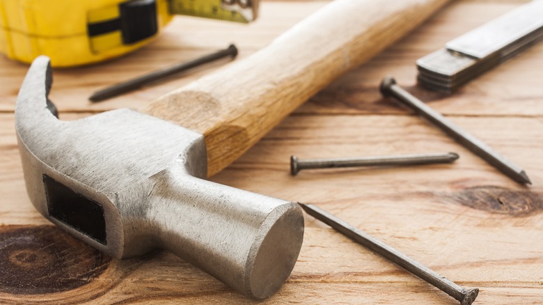 Traditional wood-handled claw hammer
