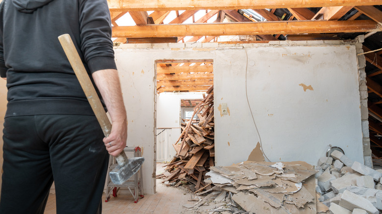 Demolition with sledge hammer