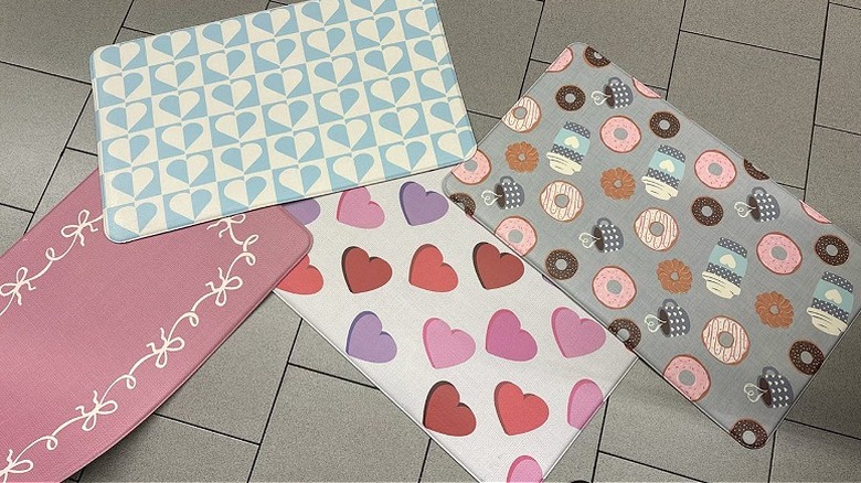 Four Valentines themed comfort mats on the floor at Aldi