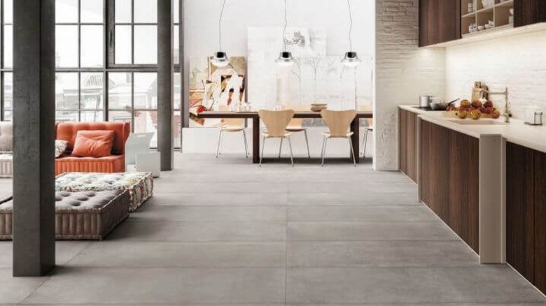 Open floor plan appartment with large nickel floor tiles