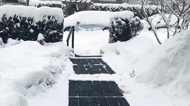 screenshot from a snowy walkway with heated mats