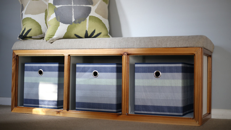 Storage containers on a cube shelf