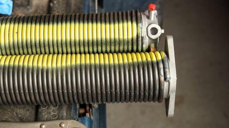 Close-up of new garage door springs