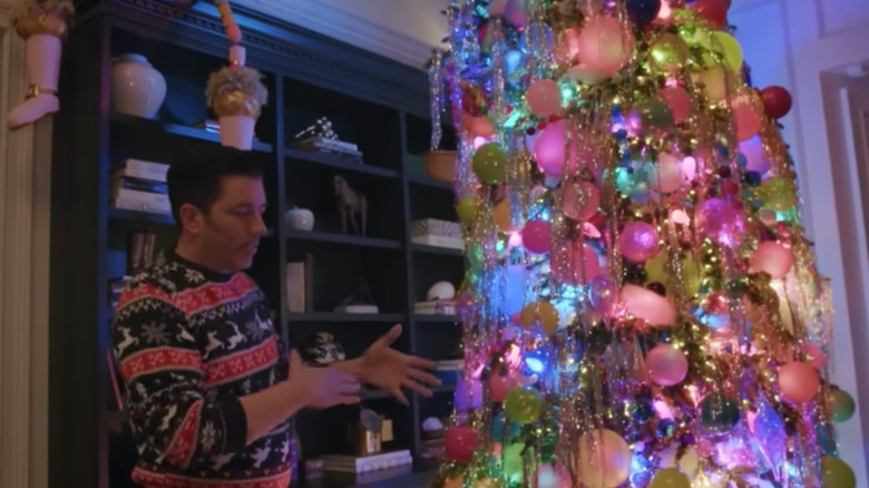 Jonathan showing off his tree