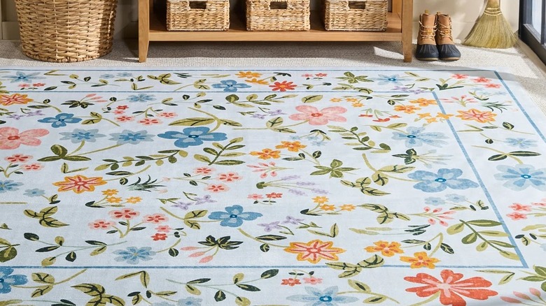 Blue floral Martha Stewart rug in an entryway