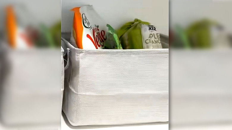 Bagged snacks in a fabric storage bin