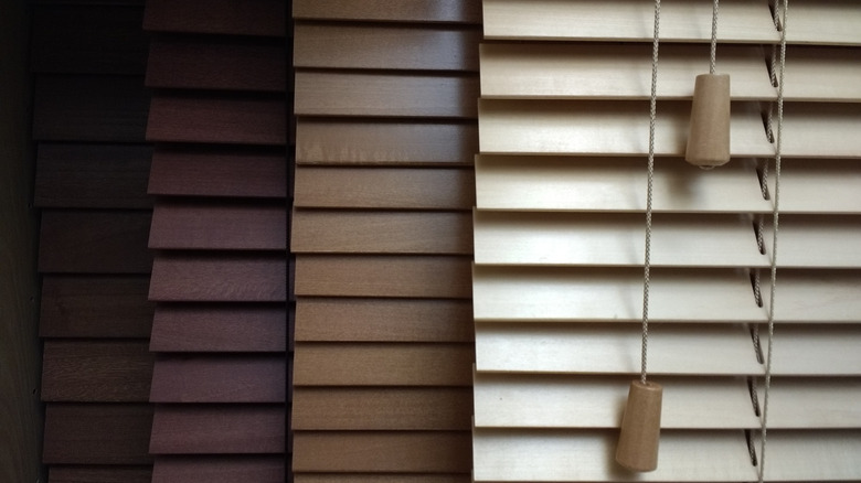 A range of coloured wooden blinds