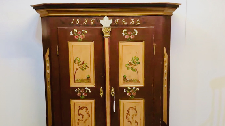 Painted German Biedermeier-era armoire with light painted detailing