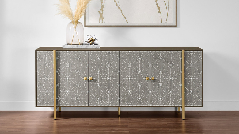 Brown media console from Costco with geometrical designs
