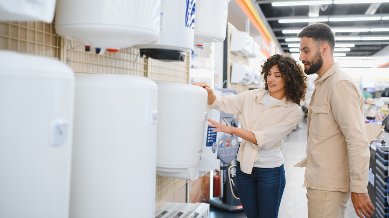 Couple choosing a water heater