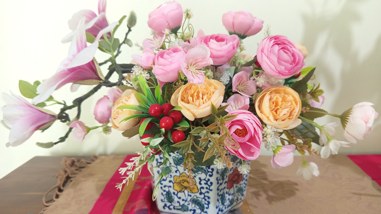 Close up of flowers in a porcelain vase
