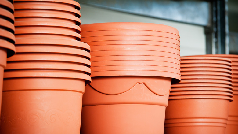 plastic planters stacked up