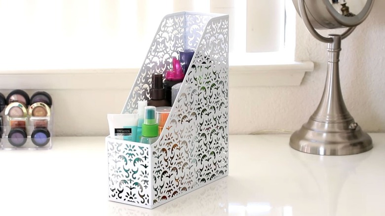 hair and beauty products in a magazine holder