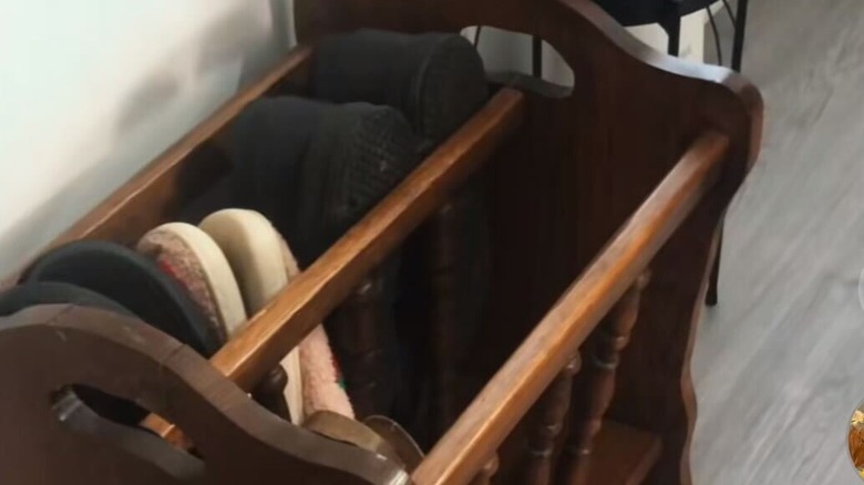 Magazine rack holding shoes