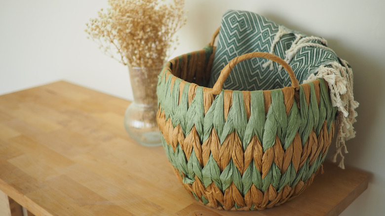 Woven basket on a dresser table
