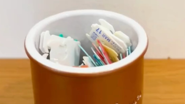 jar filled with bread tags