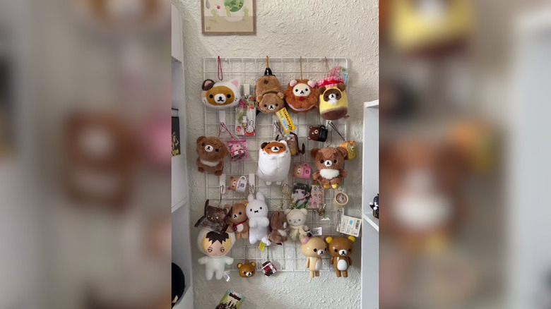 Plush keychains and trinkets on a wire grid display