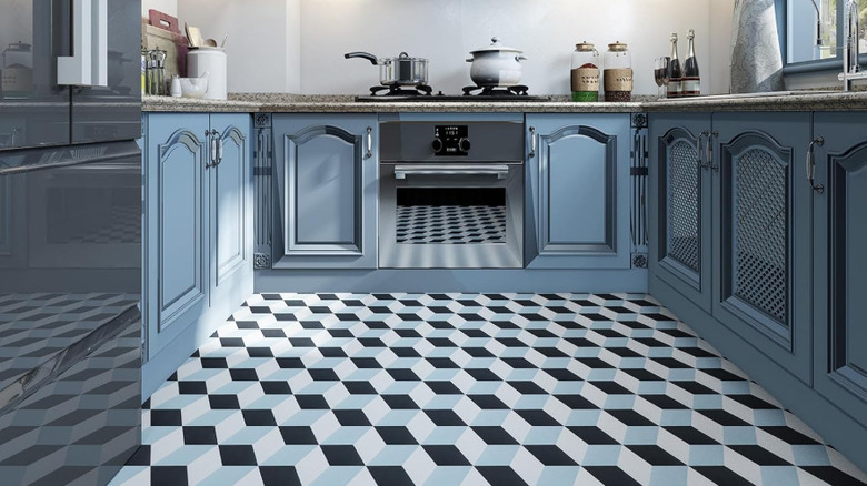 Blue, black, and white 3D-inspired vinyl floors in a kitchen.