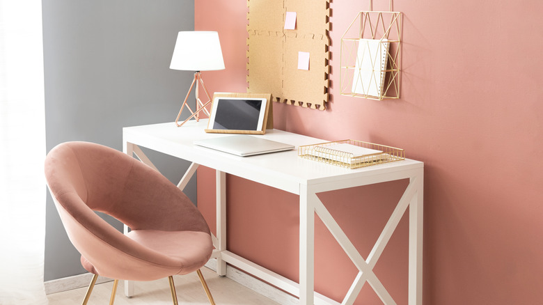 Earthy pink accent wall in a home office