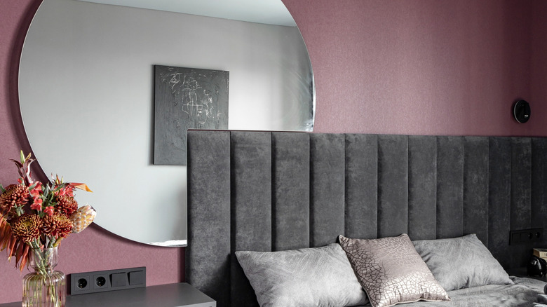 Plum purple accent wall in a bedroom