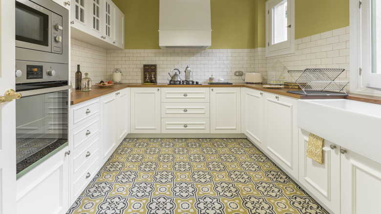 Kitchen with patterned tiled flooring