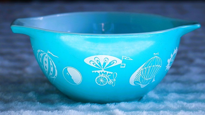 A vintage blue Pyrex bowl in the Cinderella style