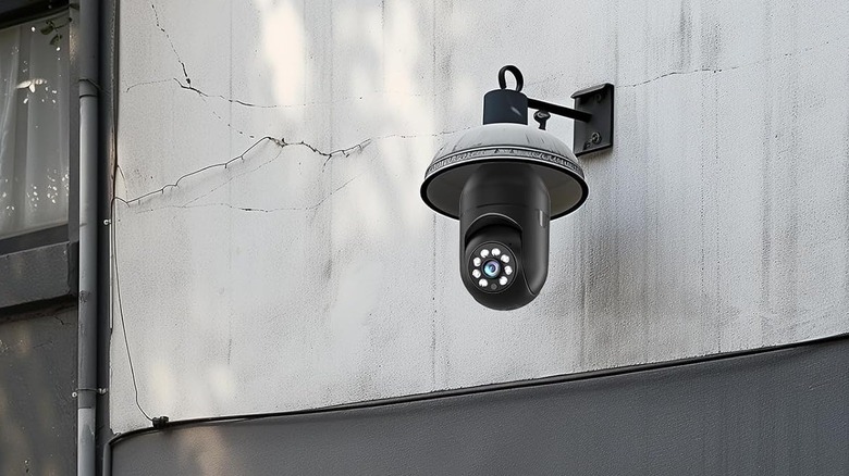 lightbulb security camera on wall