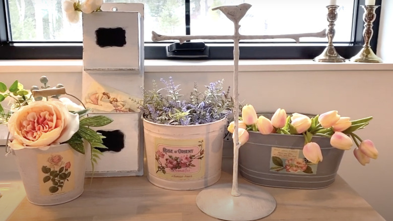 Buckets filled with flowers