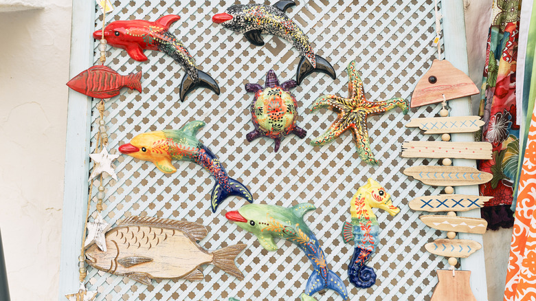 Fish decorations hanging on a trellis