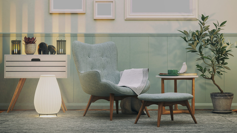 A modern living room with dual colored wainscoting and a chair rail.