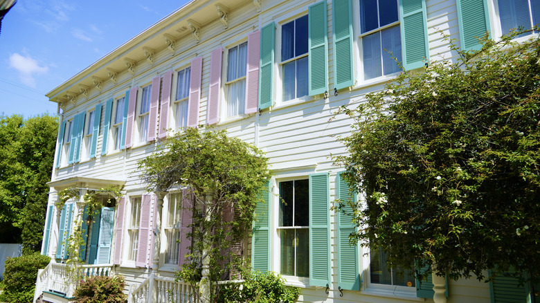 various pastel colored shutters on home