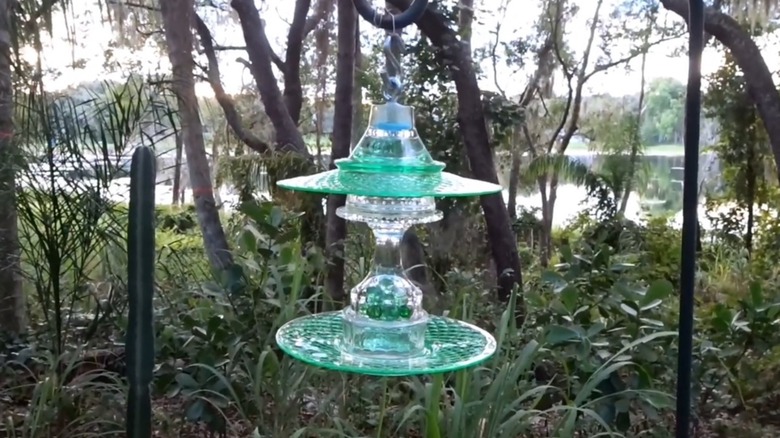 hanging glass bird feeder using glass pieces