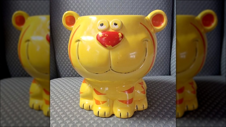 Tiger vintage cookie jar on chair