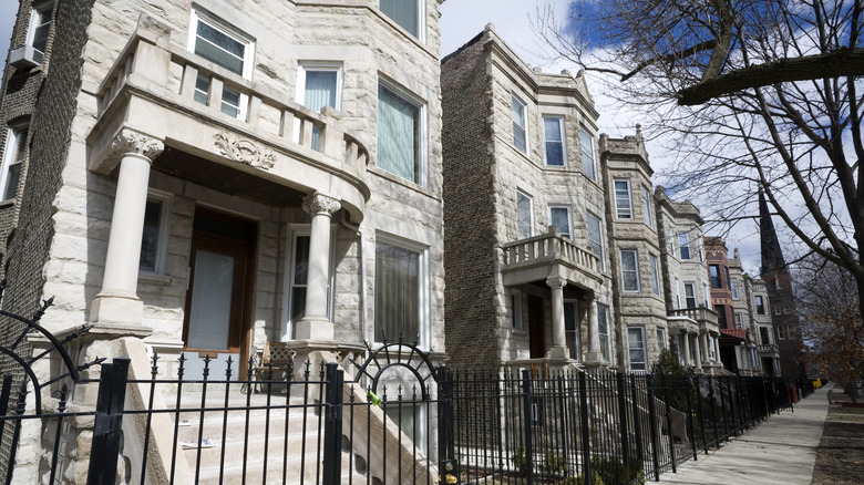 A street lined with greystone houses in Humboldt Park, Chicago.
