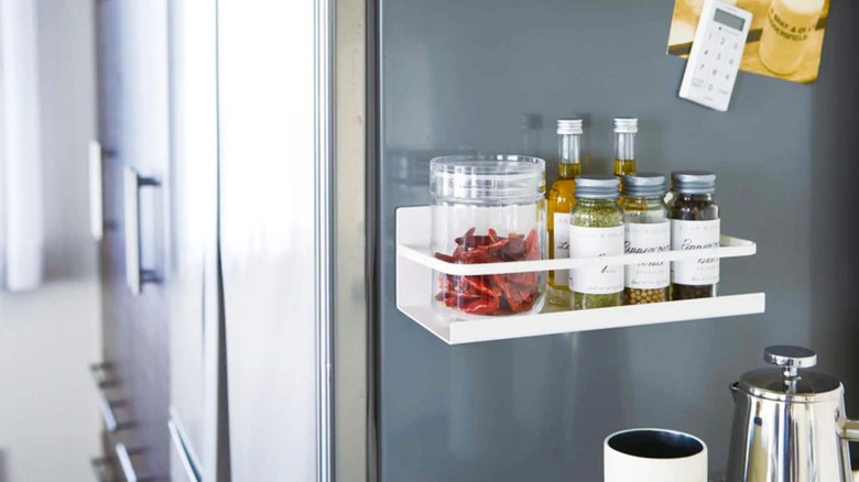 Neat magnetic shelf on the side of fridge