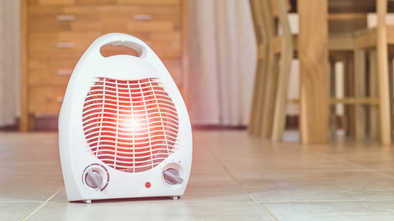 a heater lying on floor in a cozy room