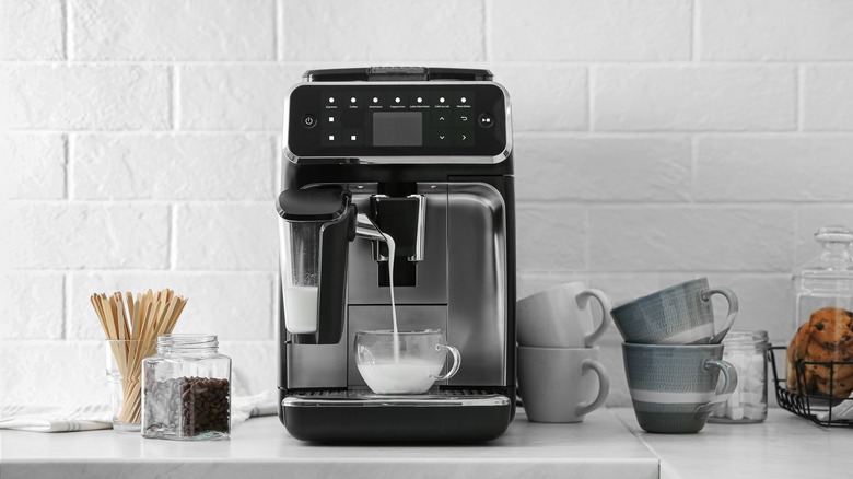 coffee machine creating a cappuccino