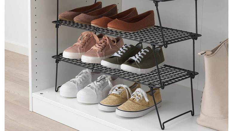 Thre GREJIG Shoe Racks stacked together holding shoes