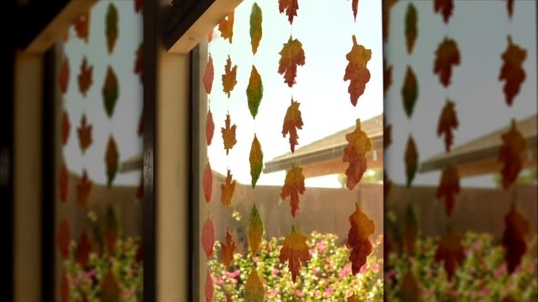 door frame hanging curtain made from DIY leaves
